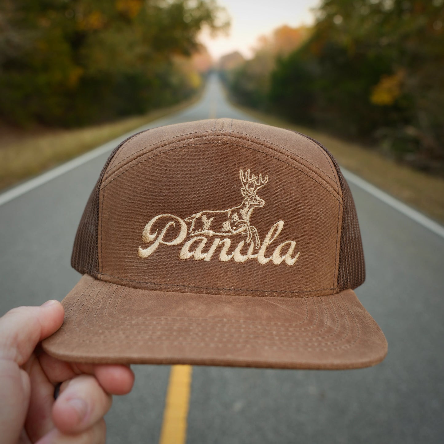 FENCE JUMPER PANOLA BUCK 7 PANEL WAXED TRUCKER HAT