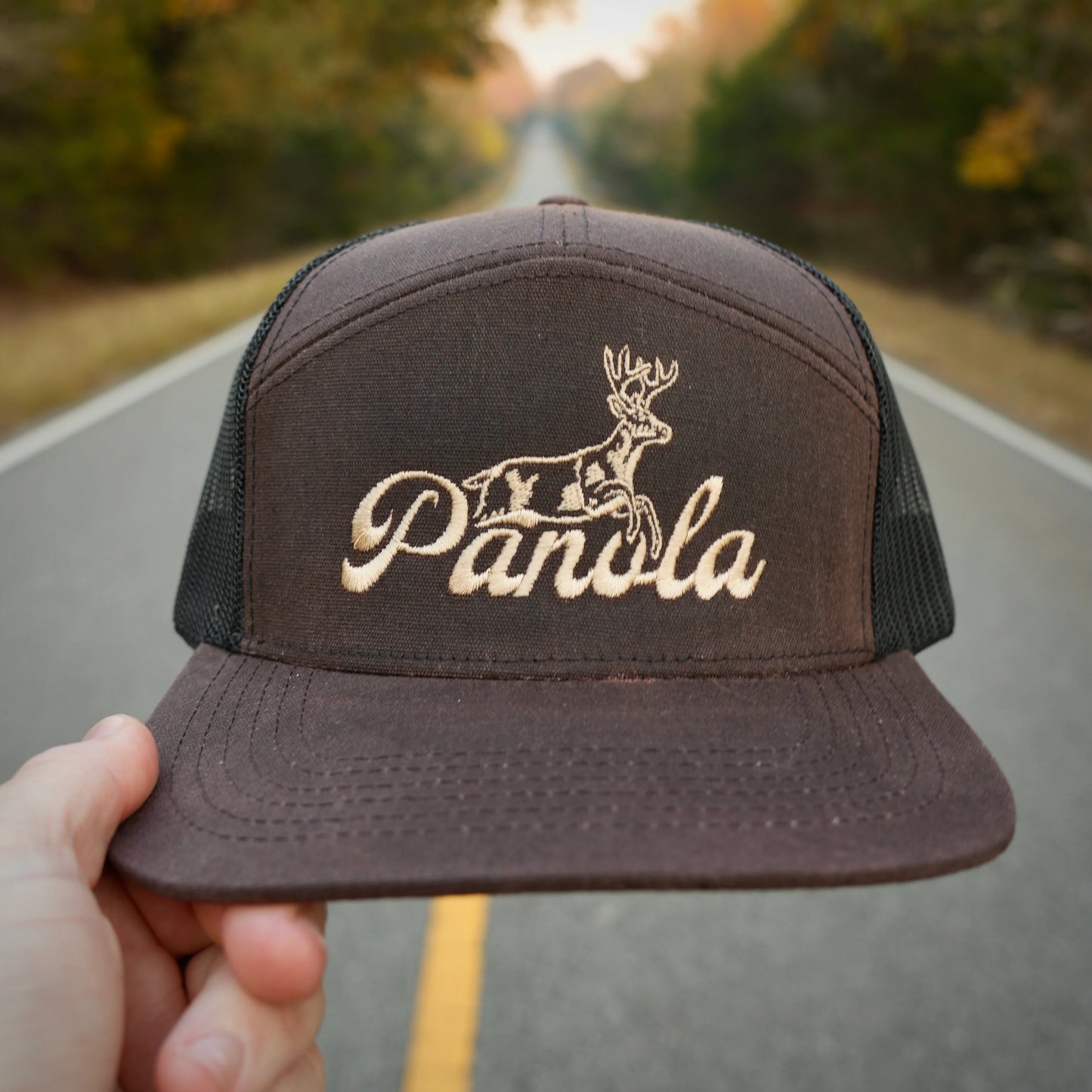 FENCE JUMPER PANOLA BUCK 7 PANEL WAXED TRUCKER HAT